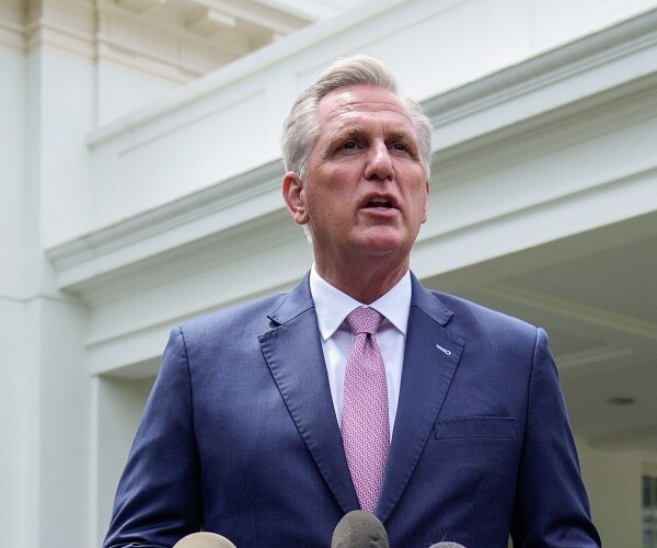 kevin mccarthy speaks into mic in driveway