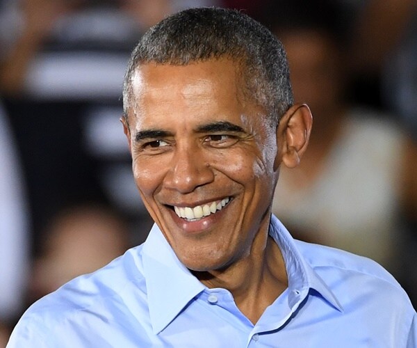 barack obama giving a speech at a rally