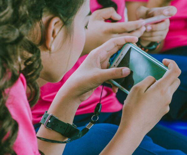 students using smartphones