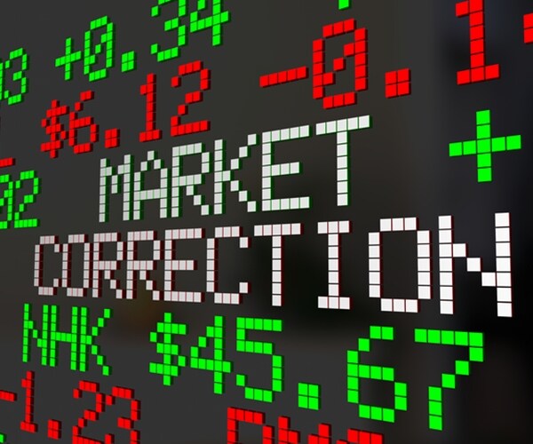 graphic shows the words market correction on stock market digital board