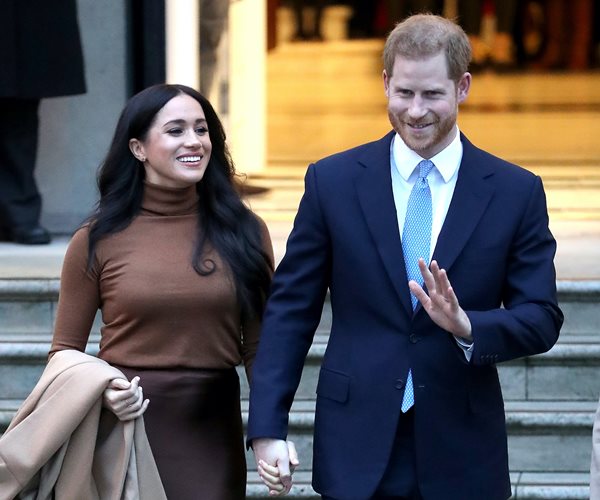 Prince Harry and Meghan to 'Step Back' From Royal Family