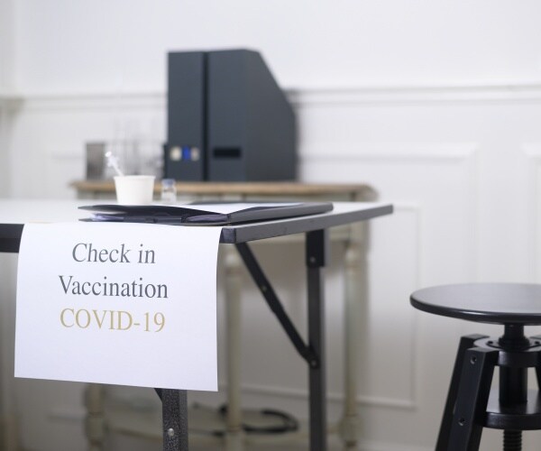 check-in at a center for COVID-19 vaccine