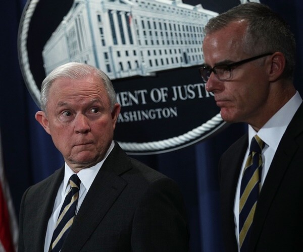 jeff sessions looks at andrew mccabe