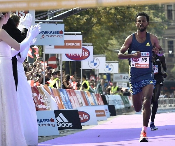 man runs marathon race