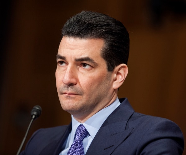 gottlieb in a suit and blue tie and shirt