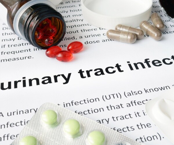 Urinary tract infection definition in book and different pills around it