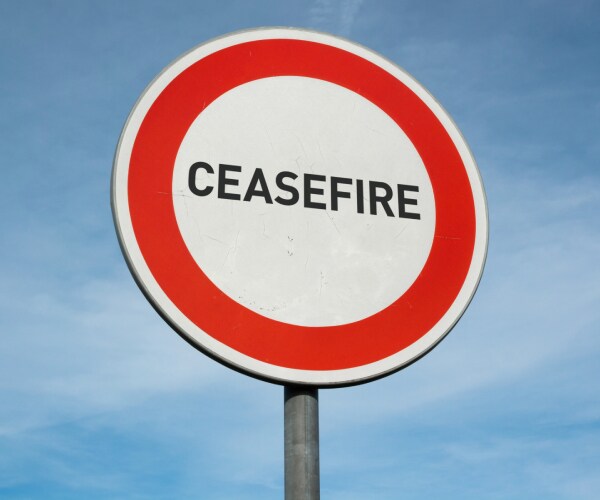 a street sign reading ceasefire