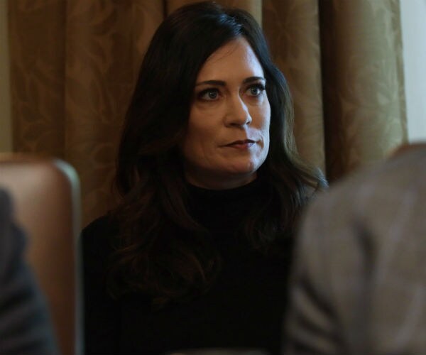 White House Press Secretary Stephanie Grisham is shown in a black turtle neck