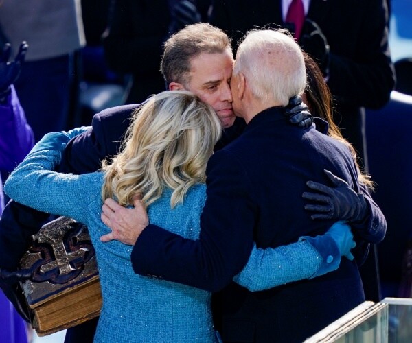 joe biden and hunter biden pose for a picture.