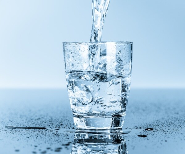 water being poured into a glass