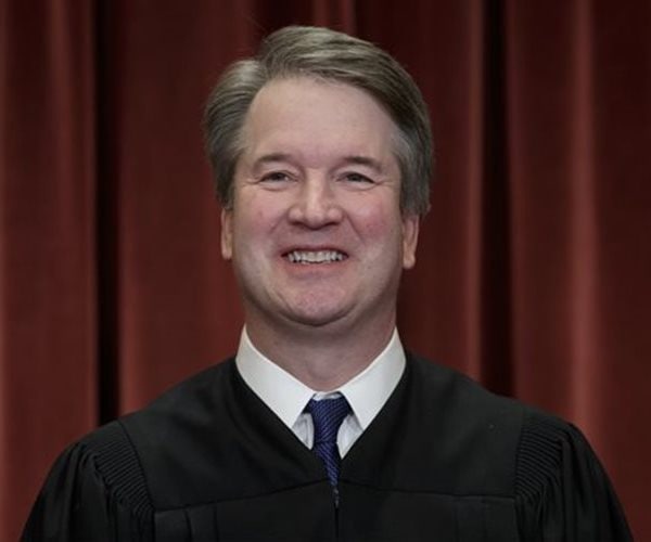 brett kavanaugh is shown in his supreme court robe