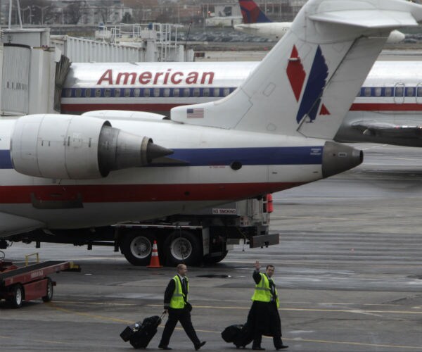 airplanes parked at laguardia airport in new york.