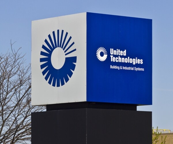 united technologies corproate logo in blue and white outside building