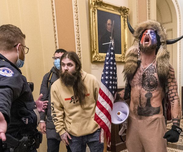 'QAnon Shaman' Pleads Guilty to Taking Part in Attack on US Capitol