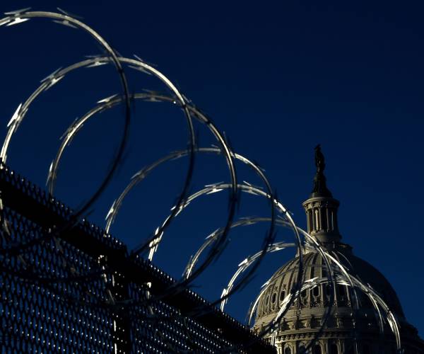 Stay or Go? Fence, Guard Pose Capitol Security Questions 