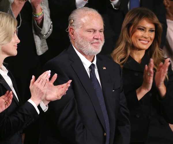 rush limbaugh stands while others applaud him