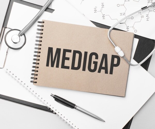 Medigap on papers, stethoscope