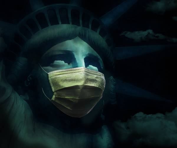 tjhe statue of liberty wearing a surgical mask with storm clouds in the background