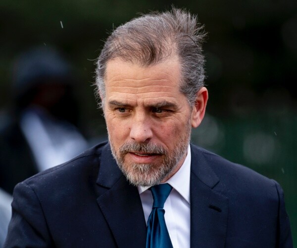 closeup of hunter biden in blue suit and tie