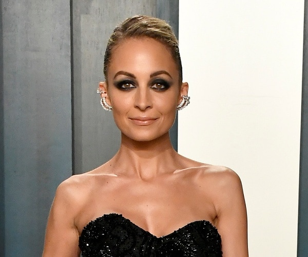 nicole richie stands on red carpet