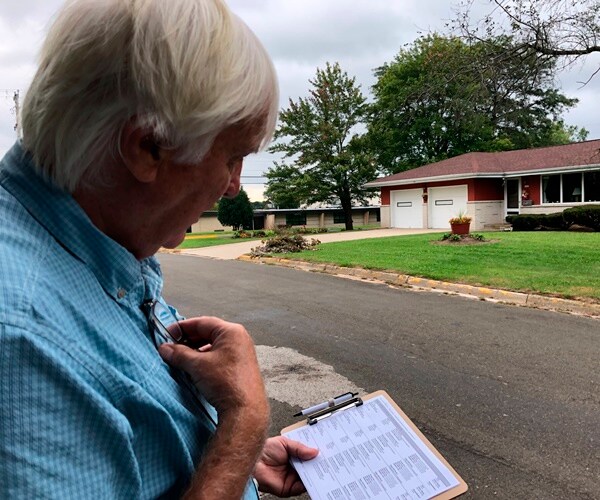 organizer bill chandler canvasses houses