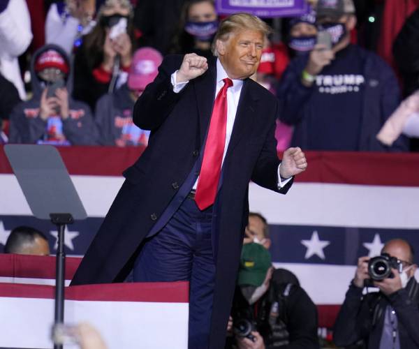 trump dancing to a song with fans cheering