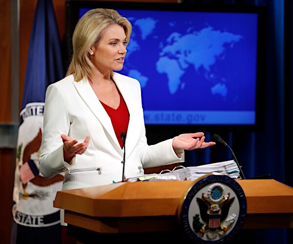 heather nauert gestures while delivering during a state department news conference