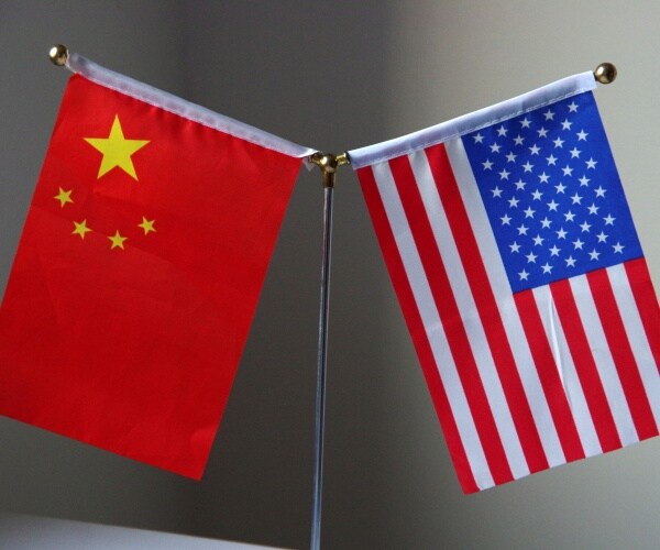 chinese and us flags are shown