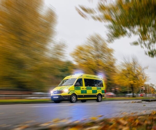 ambulance driving fast on street