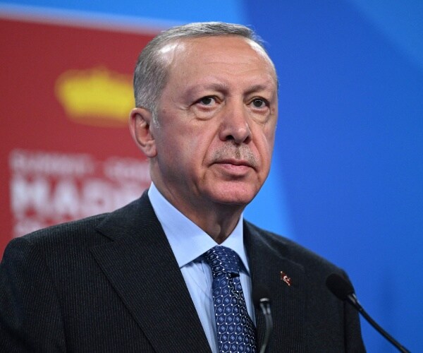 recep tayyip erdogan addresses media at a conference