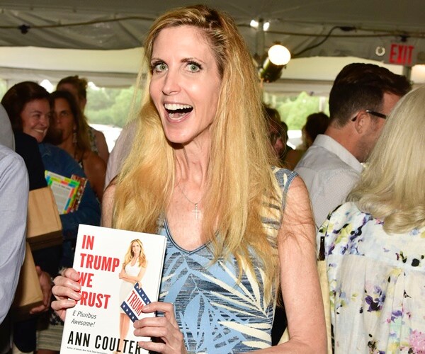 ann coulter holds her book at an author's night