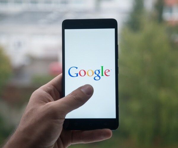 google logo is shown on a smartphone