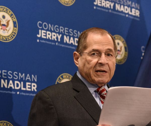 jerrold nadler looks to his right during a news conference