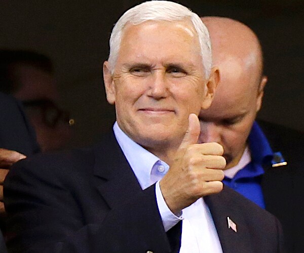 mike pence gives a thumbs up