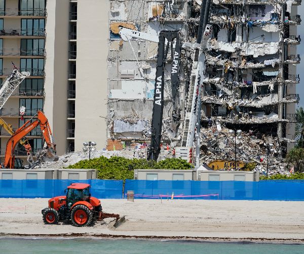 Death Toll in Florida Condo Collapse at 22, Nearby Building Evacuated 