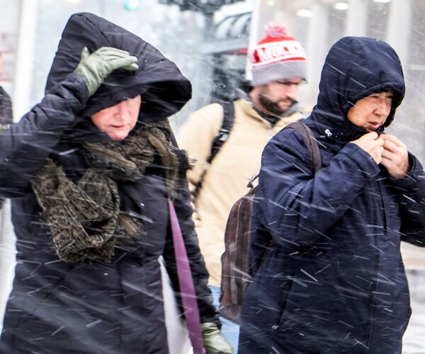 Snow and cold temperatures plagued Chicago Monday morning