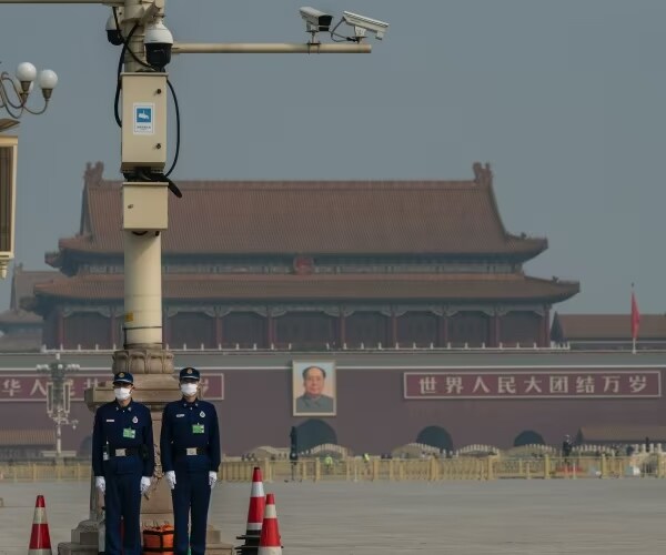 chinese soldiers stand guard