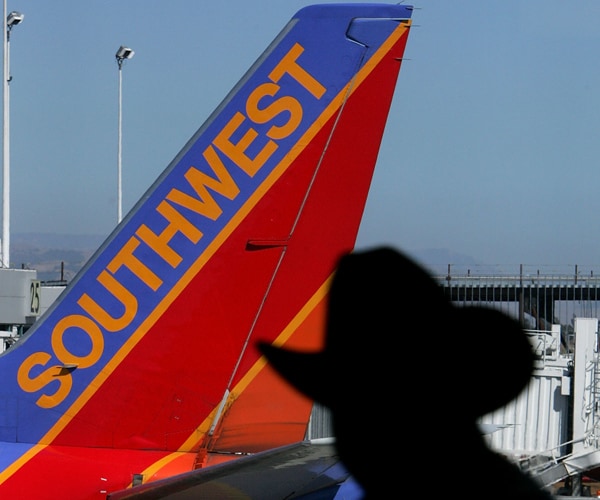 Southwest Flight Diverted After Woman Tries to Open Emergency Exit