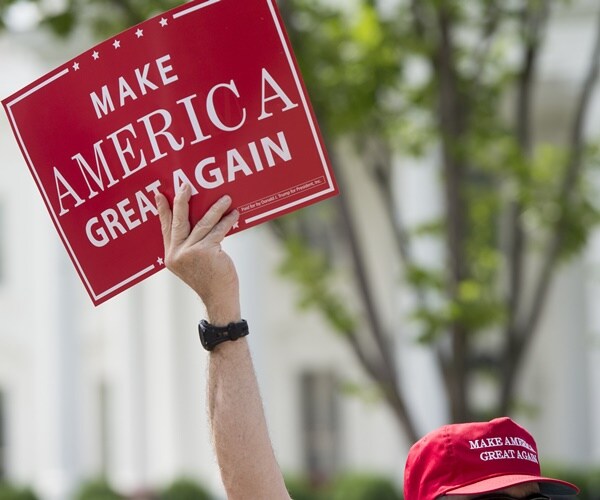 make america great hat and sign