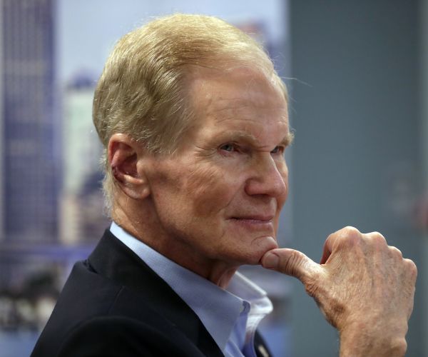 fla. sen. bill nelson listens during a roundtable discussion with education leaders from south florida. 