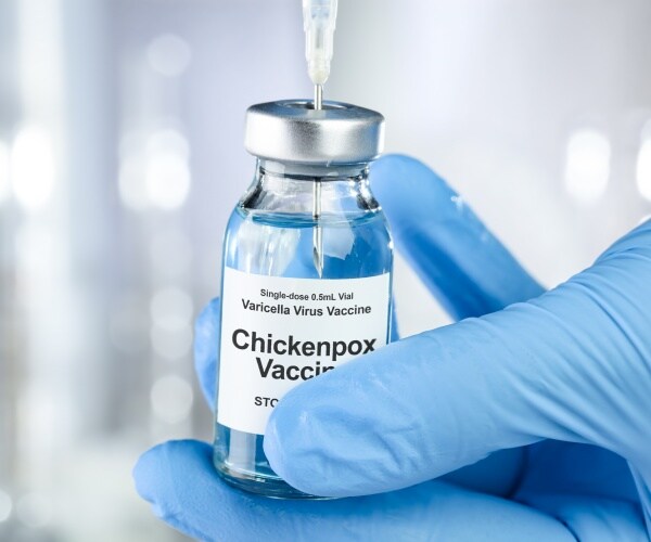 vial labeled Chickenpox vaccine and a syringe