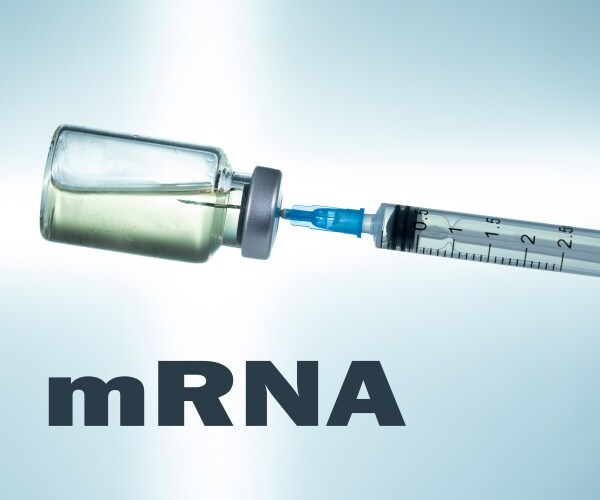 a vial of vaccine, syringe, labeled mRNA vaccine