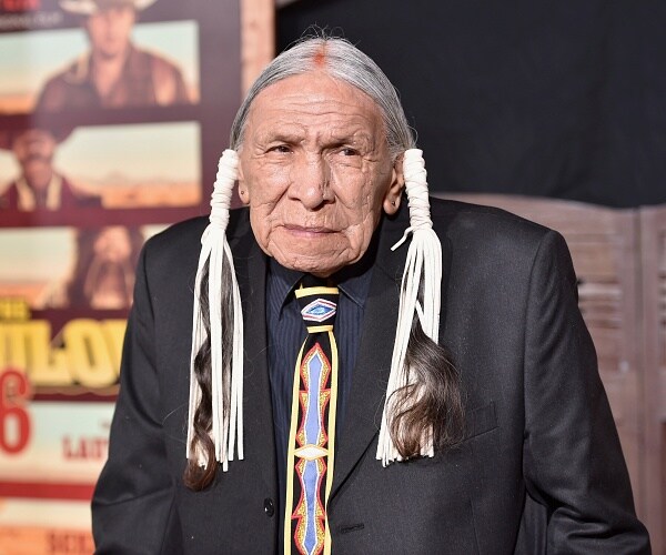 saginaw grant arrives at movie premiere