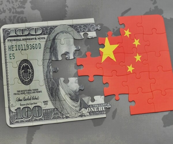 puzzle with the national flag of china and dollar banknote on a world map background