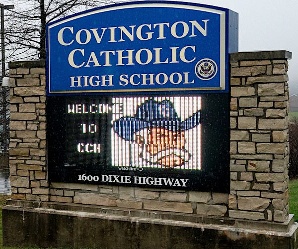 the sign of covington catholic high school outside the school