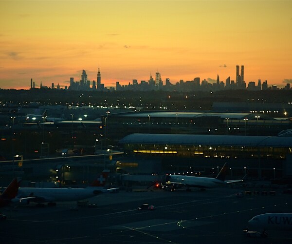 john k. kennedy airport at dusk with a tarmac full of jets