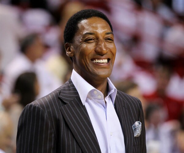 a smiling scottie pippen is shown