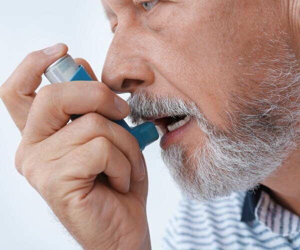 man using inhaler