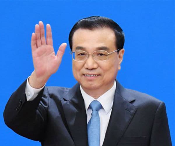 China's Premier Pledges Market Opening in Bid to Avert US Trade War