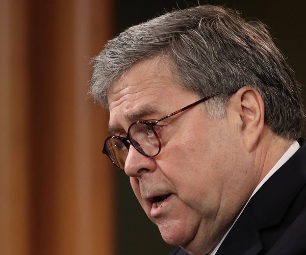 side view of william barr's head facing to the left of the frame